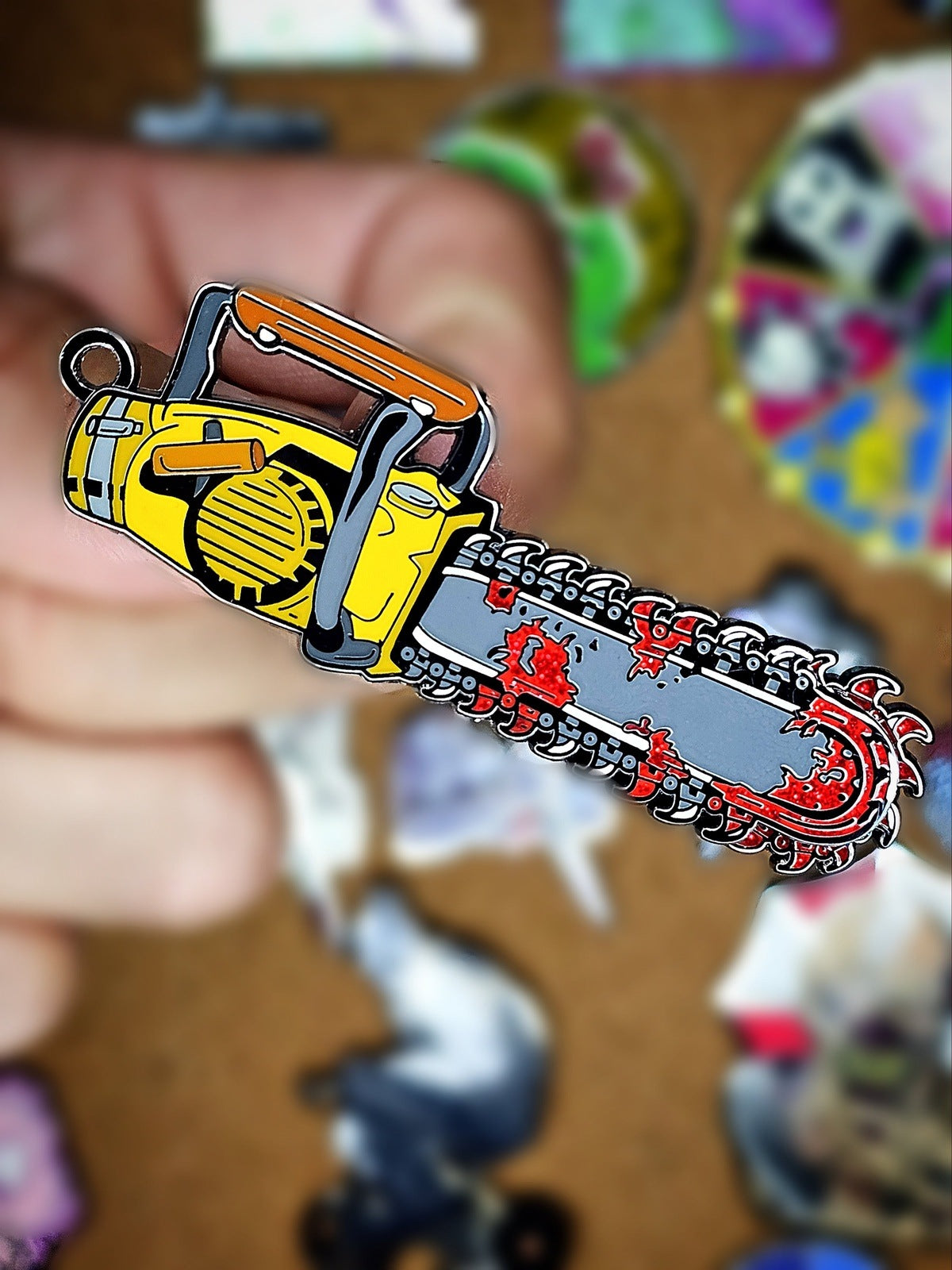 Groovy Spinning Chainsaw enamel pin/ keychain