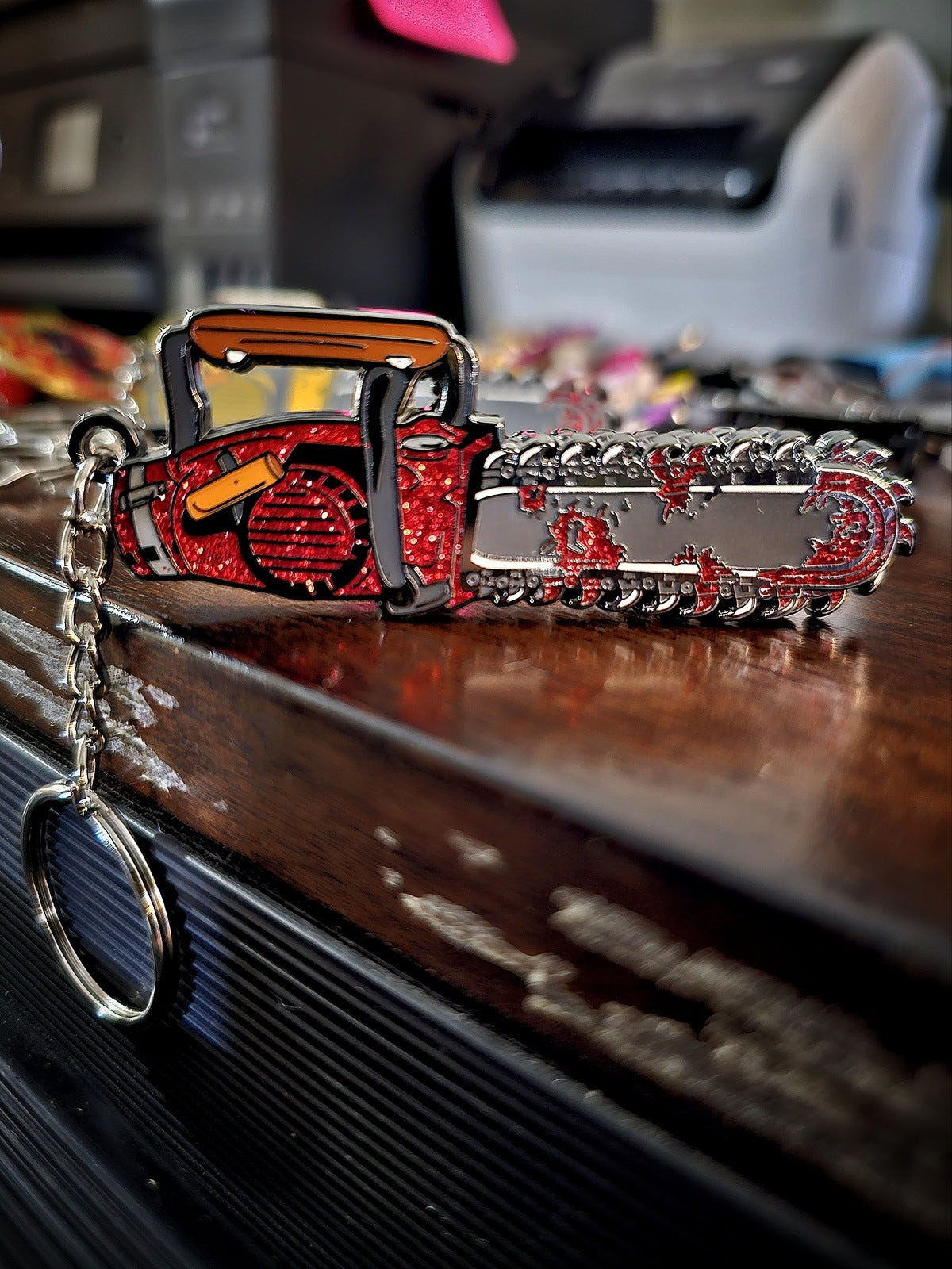 Groovy Spinning Chainsaw enamel pin/ keychain