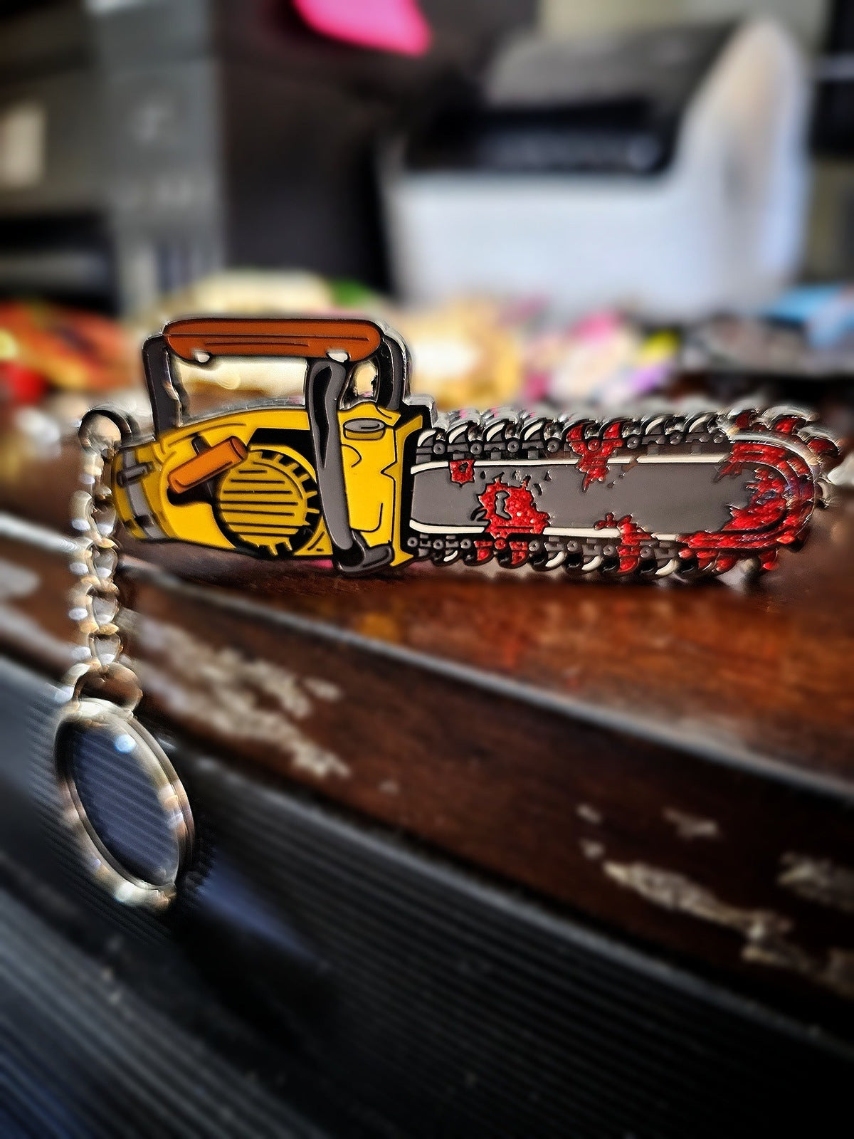 Groovy Spinning Chainsaw enamel pin/ keychain