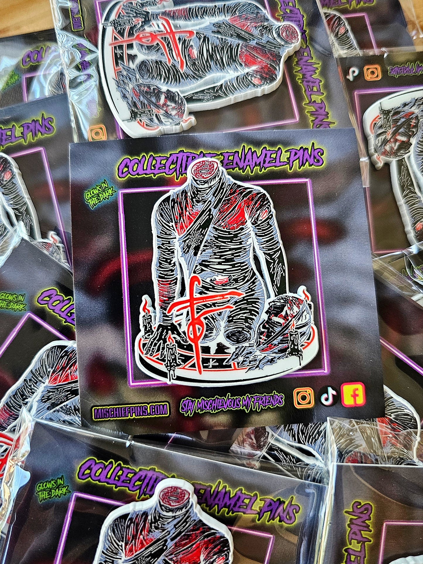 The Torso enamel pin