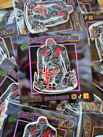 The Torso enamel pin